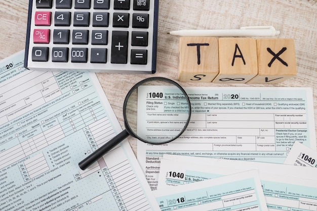 Us tax form 1040 on a wooden table concept of tax forms 1040\
financial document