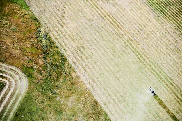 USA, Contour farming with tractor in Eastern Colorado