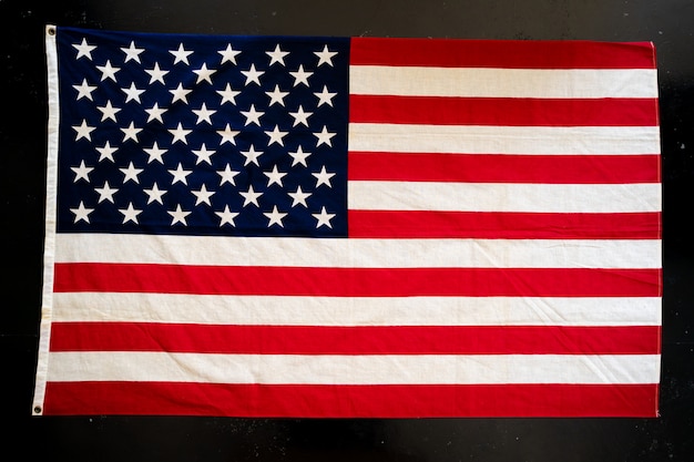 USA flag on black surface