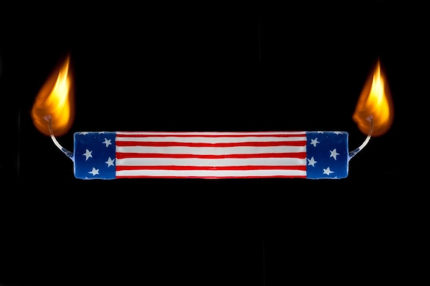 Photo usa flag candle burning both ends