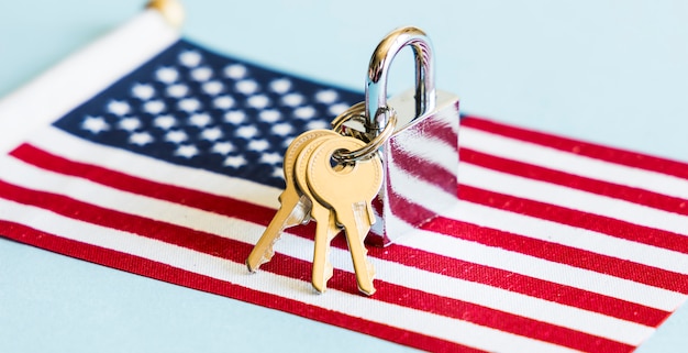 USA flag and padlock with keys