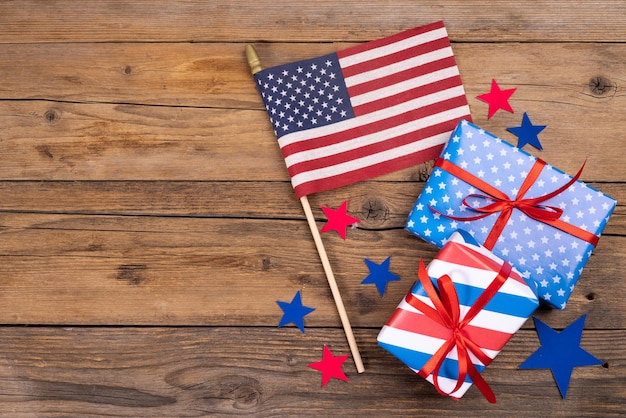 USA independence day celebration patriotism and holidays concept closeup with candy flag and stars at 4th of july party from above on wooden background