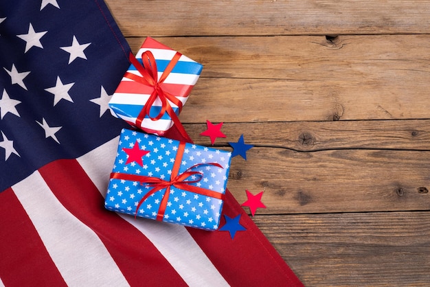 USA independence day celebration patriotism and holidays concept closeup with candy flag and stars at 4th of july party from above on wooden background