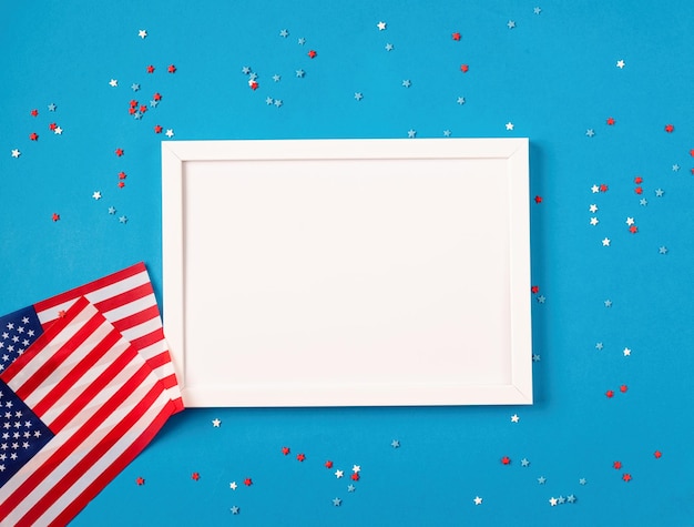 Usa independence day party elements top view flat lay on blue\
with frame for mockup