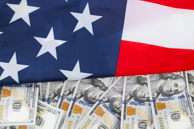 USA national flag and the dollar bills Business and finance concept