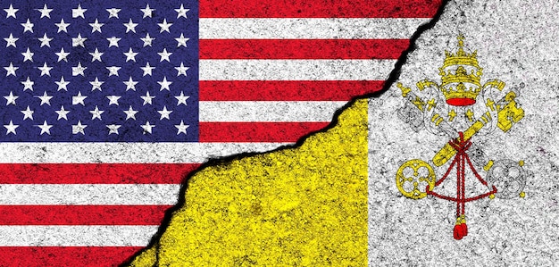 USA and Vatican city Flags painted on cracked concrete wall United States America Partnership relationships and conflict concept Banner background photo