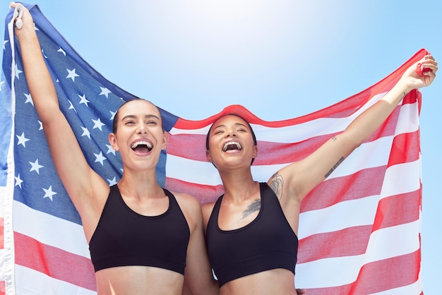 USA winner sports flag and women with support for running team happy in collaboration at fitness event and pride in sport at stadium Runner athlete friends with motivation for group competition