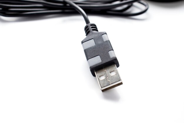 USB cable on a white surface close-up.