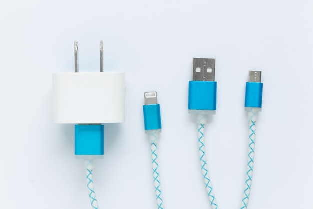 Photo usb charging cables for smartphone and tablet in top view