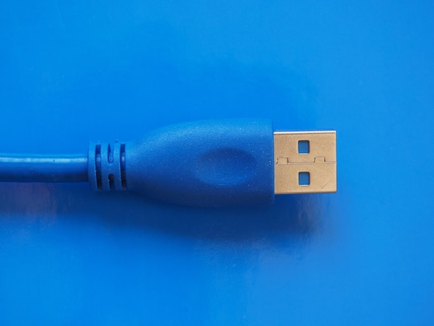 USB plug over blue