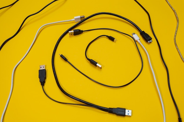 USB wires on a yellow background