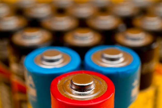 Photo used batteries arranged in a triangle shape