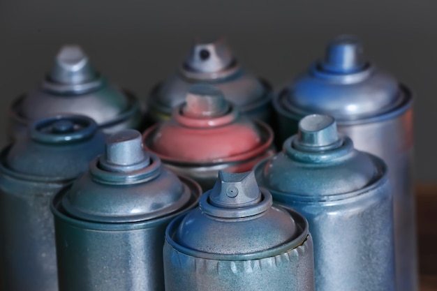 Photo used cans of spray paint closeup