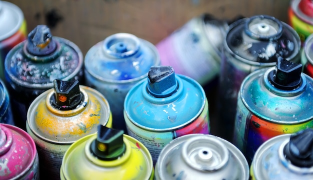 used cans of spray paint