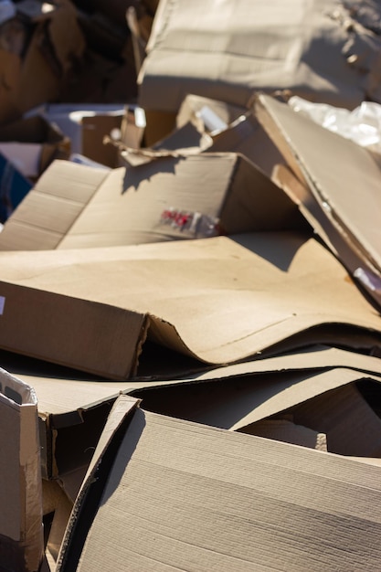 Used cardboard boxes at a collection center for recycling. Circular Economy