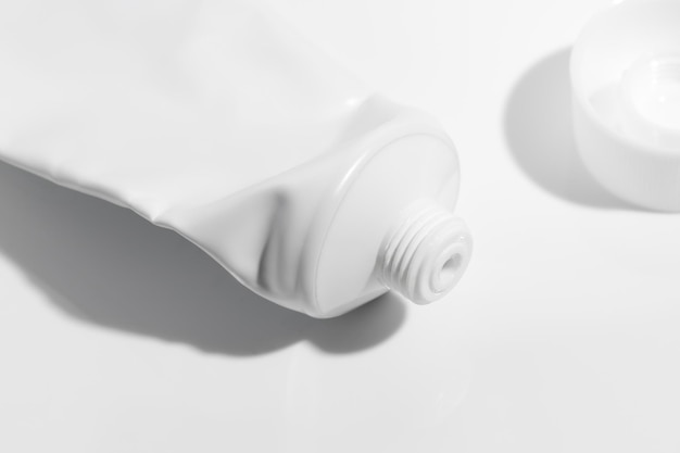 Used empty tube with opened white cap mockup template for toothpaste cream gel blank package