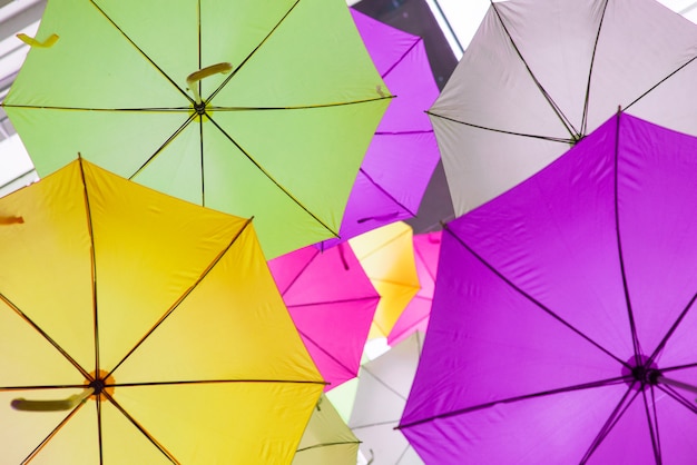 Used multi-colored open umbrellas for decoration