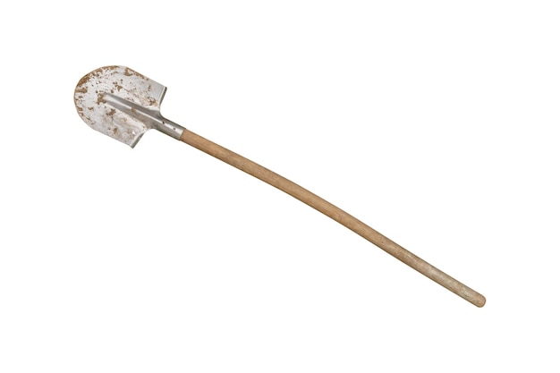 Фото Используемая лопата в земле с согнутой рукой, изолированной на белом фоне