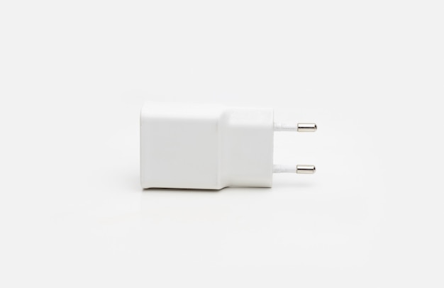 Used usb smartphone charger on isolated white background