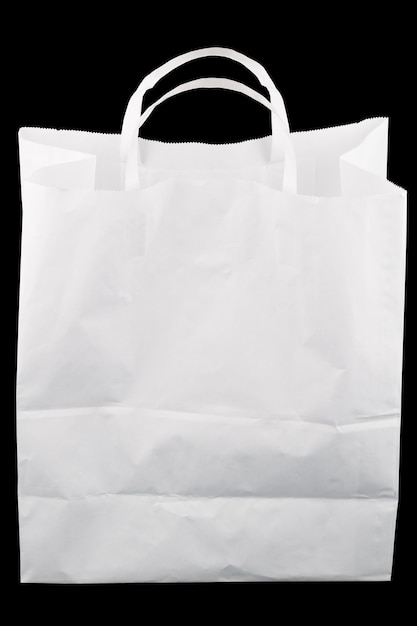 Used white paper bag with handles isolated on black background