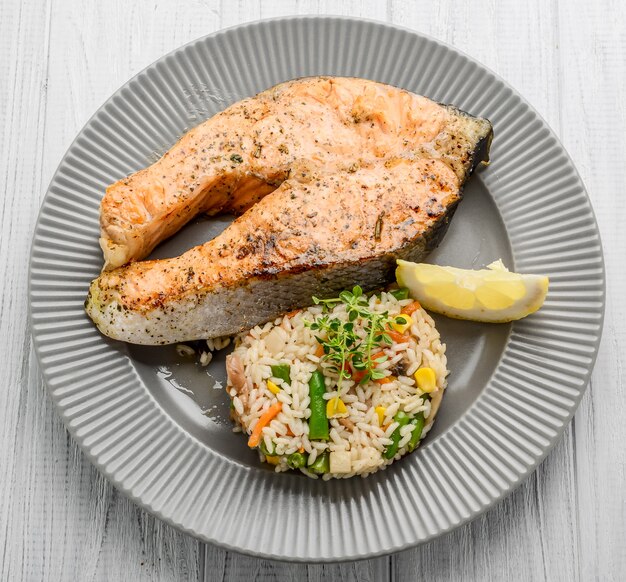 Useful and tasty food, grilled Salmon with Vegetables and Rice