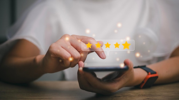 User give rating to service experience on online application\
customer review satisfaction feedback survey concept customer can\
evaluate quality of service leading to reputation ranking of\
business