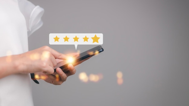 User give rating to service experience on online application\
customer review satisfaction feedback survey concept customer can\
evaluate quality of service leading to reputation ranking of\
business