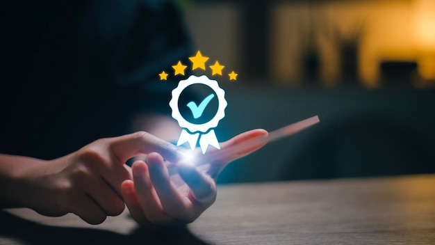 User gives rating to service experience on online application Hand of Client giving a Five Star Rating Customer can evaluate quality of service leading to reputation ranking of business