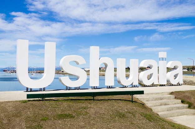 Photo ushuaia landmark ushuaia written in white letters southernmost city in the world argentina landmark