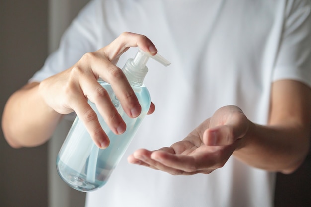 using alcohol gel for cleaning hand
