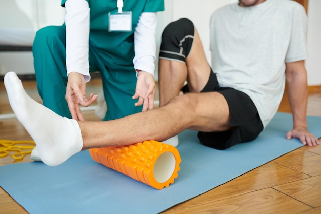 Using myofascial roll to release muscle tension