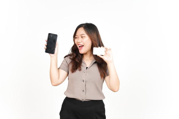 Using Smartphone and Holding Blank Credit Card Of Beautiful Asian Woman Isolated On White Background