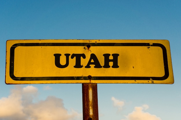 Photo utah state street on old yellow sign with blue sky