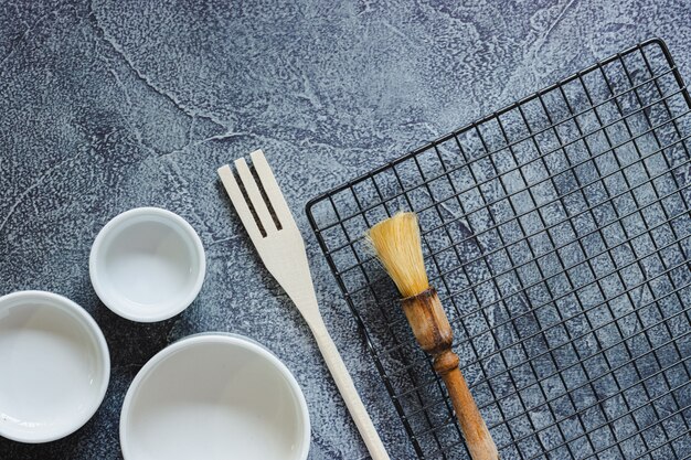 Photo utensils to prepare a cake on a textured blue surface. top view. copy space.