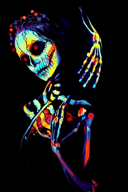 UV body art painting of Halloween female skeleton