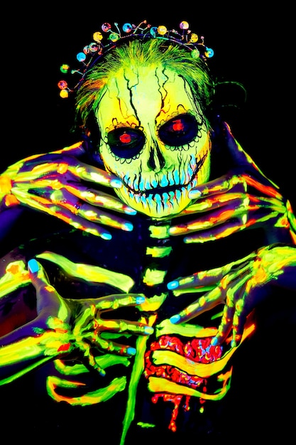 UV body art painting of Halloween female skeleton