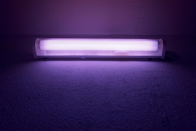 UV quartz fluorescent lamp is glowing