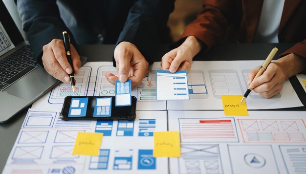 UX graphic designer planning application process development prototype wireframe for web smart phone Creative digital development agencyxA