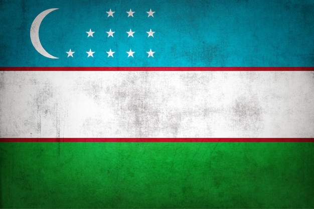 Photo uzbekistan flag with grunge texture.