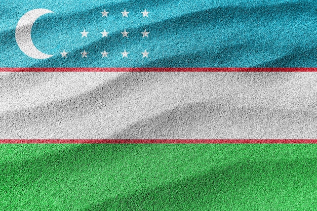 Uzbekistan sand flag, national flag sand background