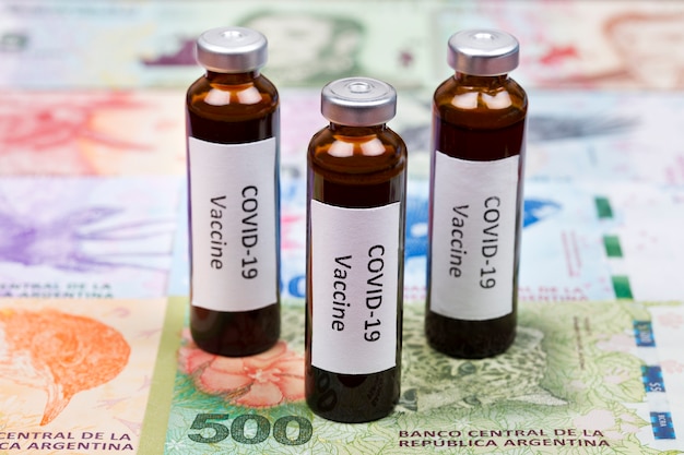 Vaccine against Covid-19 on the background of Argentinian Pesos