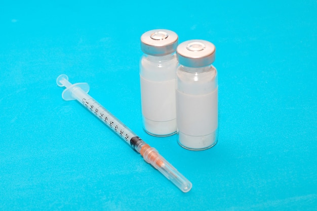 Vaccine and Medical Concept Vaccines and a syringe for the prevention and treatment of coronavirus