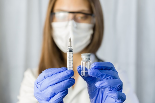 Vaccine in researcher hands