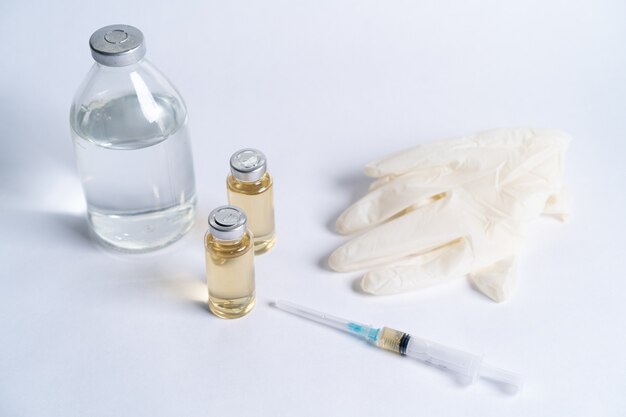 Vaccine and syringe, covid 19