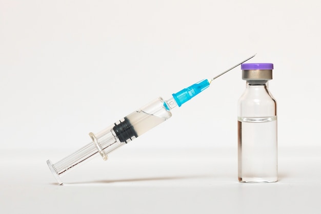 Vaccine and syringe injection.