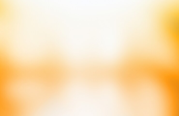 Vage lichtgele of gouden gradiënt bokeh abstracte achtergrond