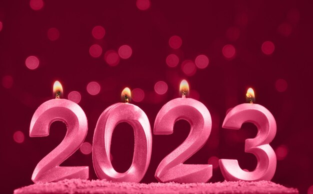 Vakantie achtergrond Happy New Year Numbers 2023 gemaakt door viva magenta kaarsen