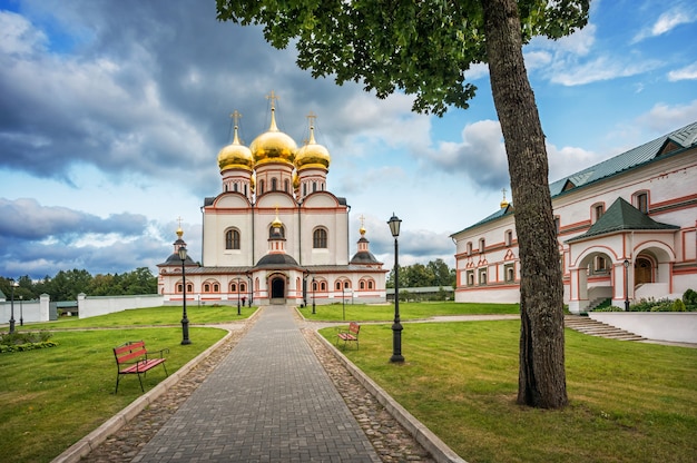 Valday. Iversky Cathedral of the Iversky Monastery on a evening and clouds