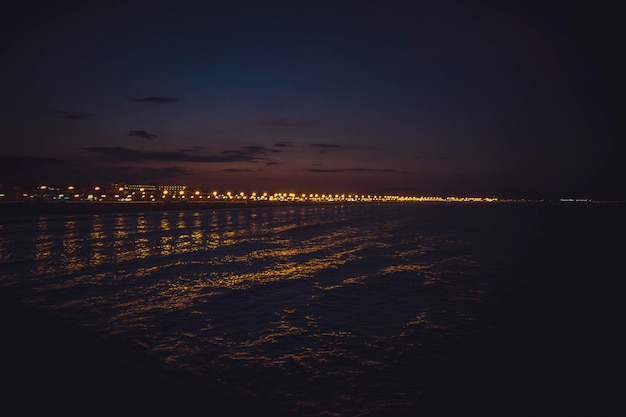 valencia beach at night, seen from the harbor, Spain