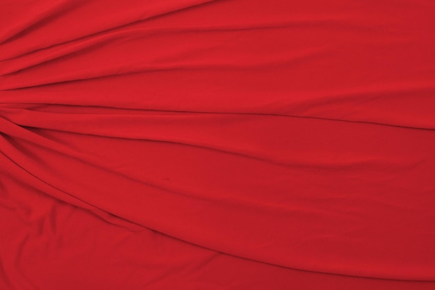 Valentijn geïnspireerde abstracte vloeiende rode stof achtergrond